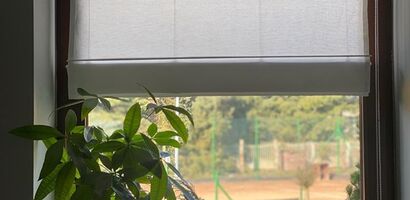 Installation of the Roman blind on the frame