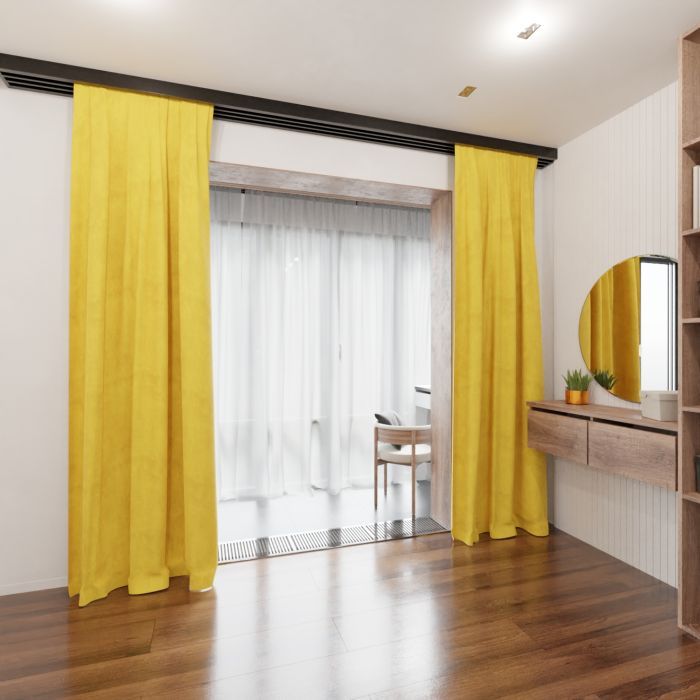 Yellow drapes add warmth to the interior
